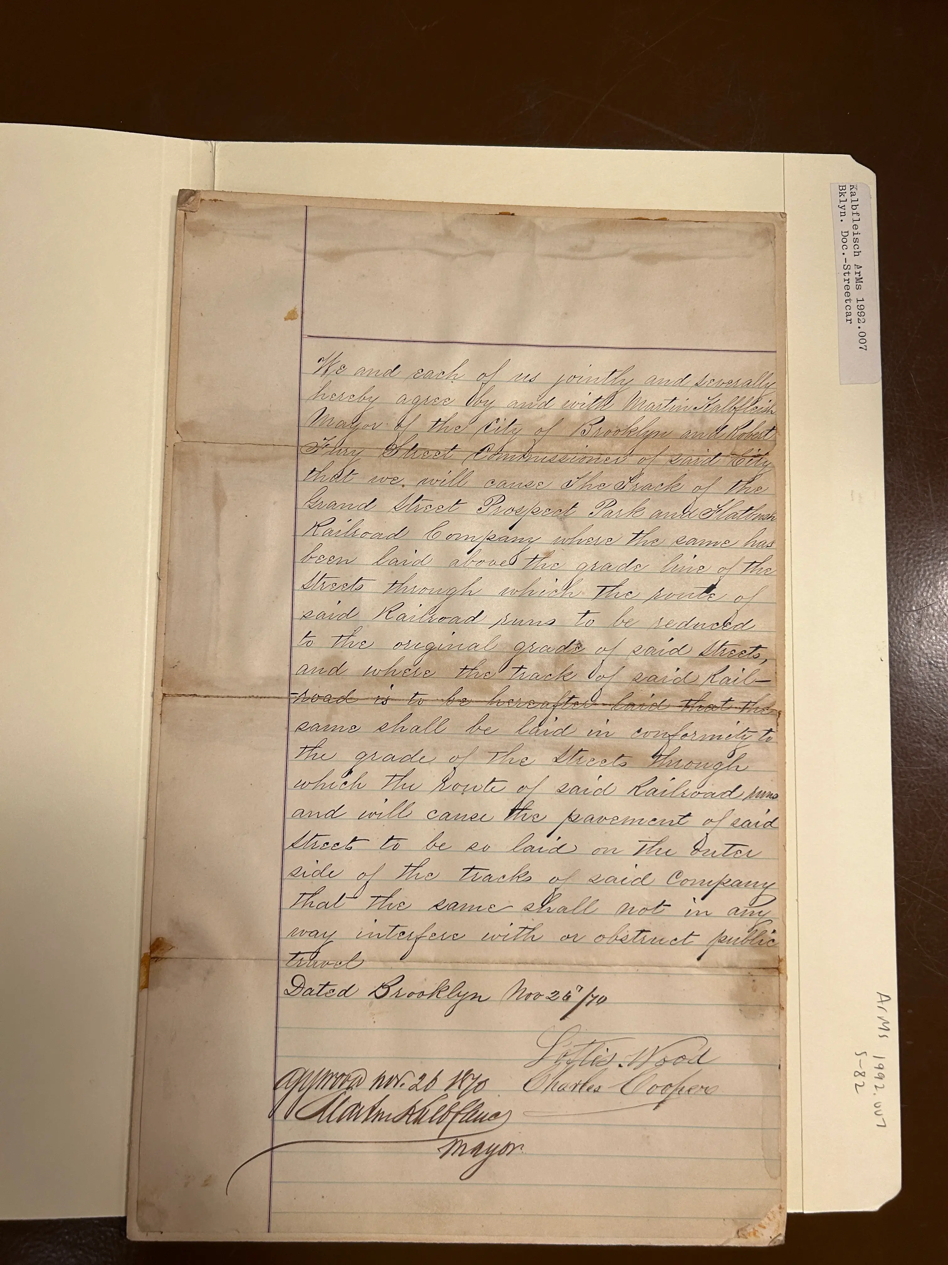 agreement-with-flatbush-railroad-co.webp "An image of a historically preserved agreement between the Flatbush Railroad Company and the Mayor of Brooklyn from 1870."